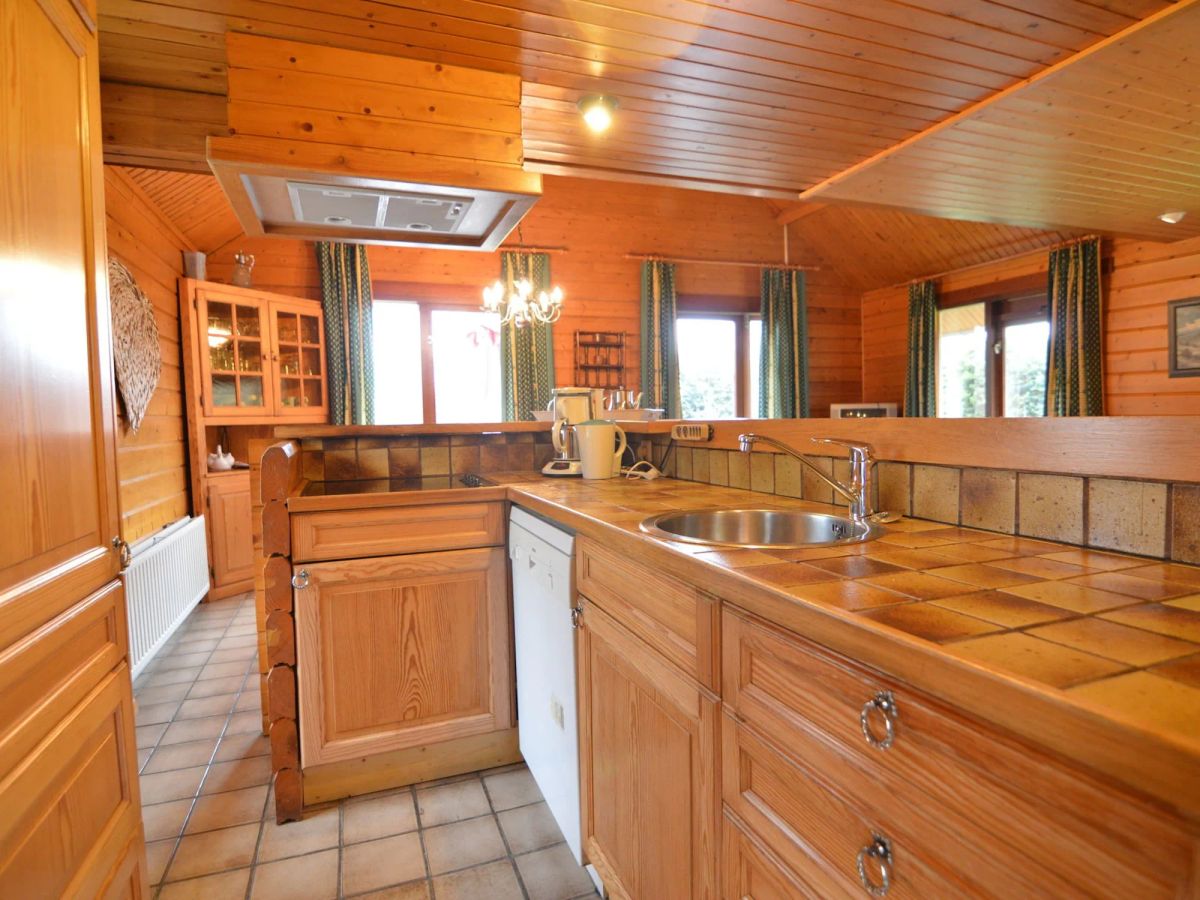 Image of A Wooden Chalet Located in a Quiet and Green