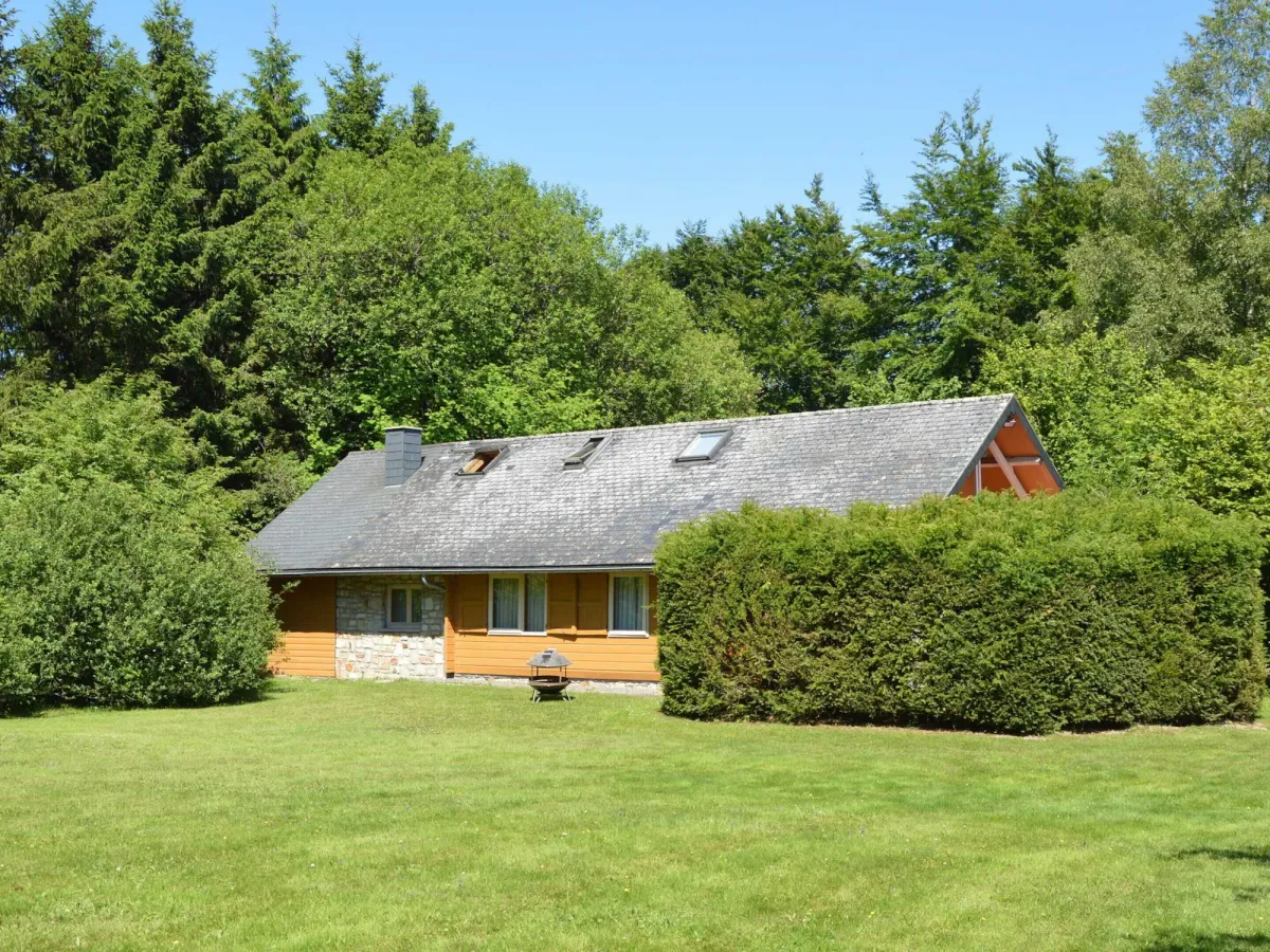 Image of A Wooden Chalet Located in a Quiet and Green