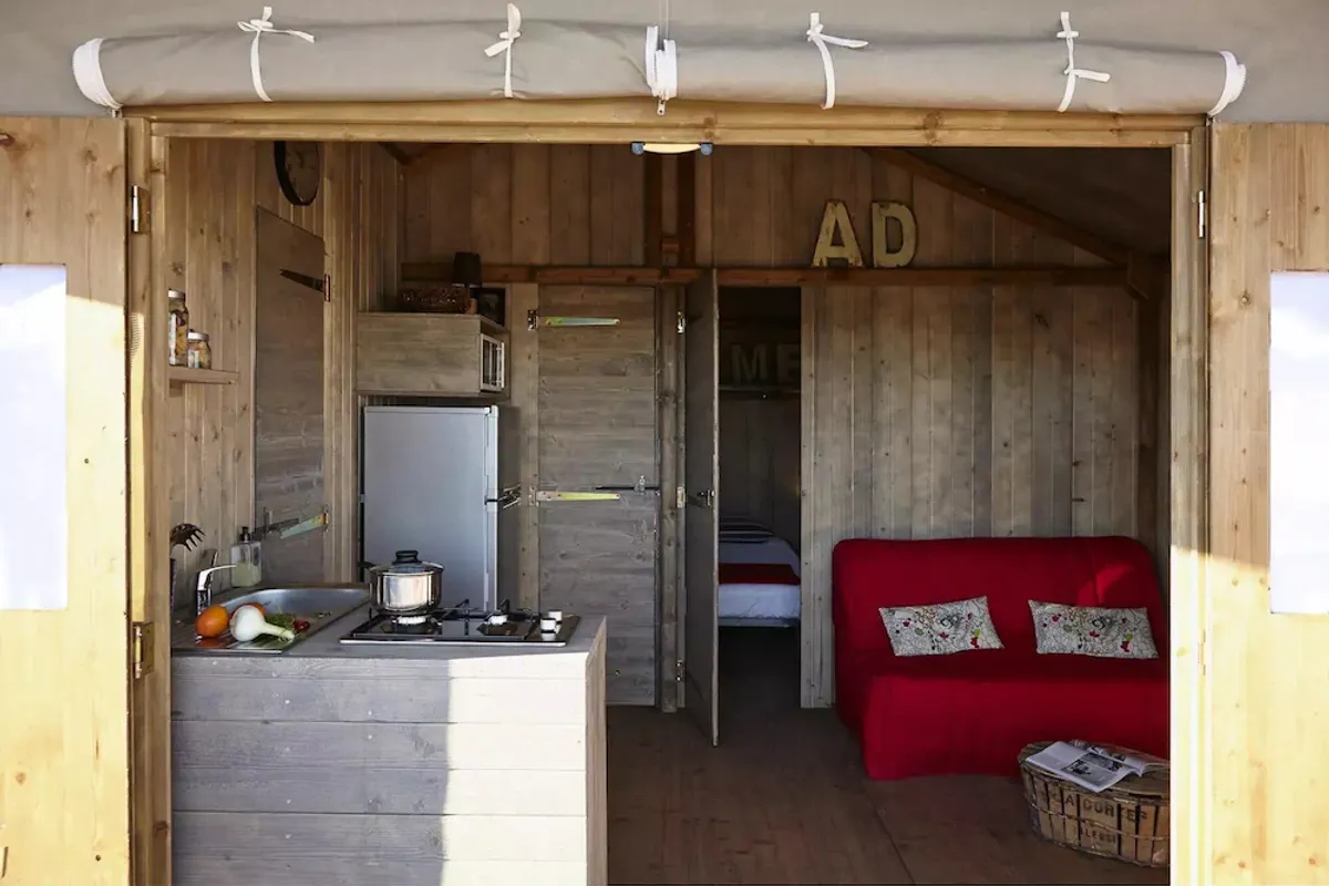 Image of Flower Camping Le Conleau **** - Cabane Lodge Bois sur pilingis COMFORT 38m2 (2 bedrooms) including covered terrace of 8m2 4 people