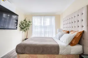 Image of Cheerful 4 bedroom home with parking on premises