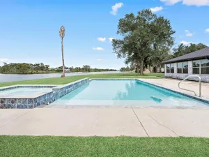 Image of Spacious waterfront home w/ pool