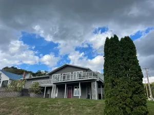 Image of A fully modeled home overlooking Mississippi River in a charming river town.