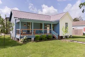 Image of Little Blue House + Downtown Tomball + small town