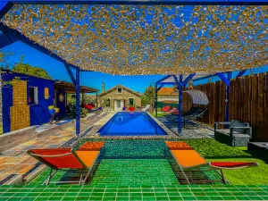 Image of Le Petit Majorelle Français, with swimming pool and garden near city center