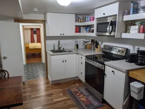 Image of Lovely basement apartment with covered outdoor patio.
