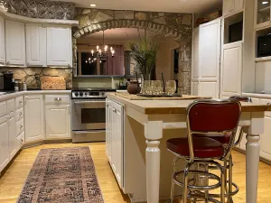 Image of North Arrow- Warm, Stylish, Edge of Town