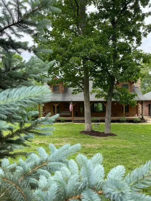 Image of Real Log Cabin with Seasonal Pool and Hot Tub near Blue Springs Ranch