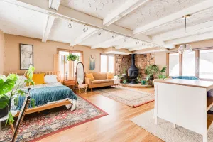 Image of Intimate Boho Oasis with Indoor Wood Burning Stove