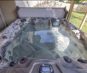 Image of Home in Clive, GREAT location, cozy, spacious, private, 5BR & hot tub!