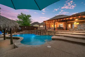 Image of Unique heated pool & spa outdoor kitchen, game room near DFW  sleeps 10-12