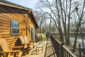 Image of Riverfront Covington Cabin with Deck and Fire Pit!