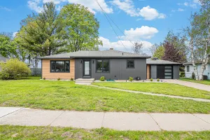 Image of Manistee Channel Waterfront Home with Boat Dock