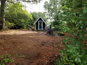 Image of Idyllic Tiny House with a Chiminea Ideal for Weekend Getaways from Boston