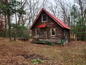 Image of Secluded Luxury Cabin with Hot Tub on 10 Private Acres near Trails in Reed City, Michigan