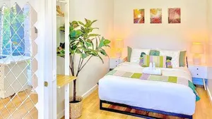 Image of Modern Family Oasis - 4BR, Free Parking, Steps to Shops & Train