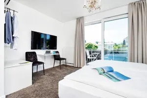 Image of Hotel Velden - 24 Checkin Zimmer im Zentrum