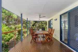 Image of 12 Ibis Court Highset Beach House With Natural Bushland Gardens And Covered Decks