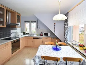 Image of Lovely Holiday Home in the Thüringer Forest With Balcony, Deckchairs and Barbecue Area