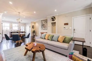 Image of Bougainvillea DC 2 bedrooms 2 bathrooms plus den with twin sofa bed and queen sofa bed in living room