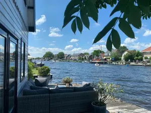 Image of Holiday home at the water, fire place, boat and SUP rent, near Amsterdam