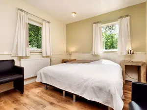 Image of Beautiful, modern house with stunning views, hot tub and sauna in green surroundings