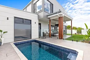Image of 4 Bedroom Home in Pelican Waters with Heated Inground Pool