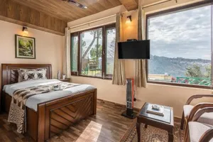 Image of StayVista at Cecil Cottages Hill view 8BR, 6BR, 4BR, 2BR in Barog with Barbeque