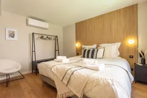 Image of Le Cosy Chic . Proche gare . Centre-ville Mâcon . Neuf . Climatisation . Design . Wifi .