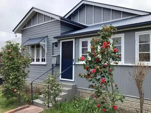 Image of Rosellas on Corundum Cottage - treat yourself!