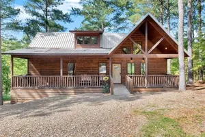 Image of Gorgeous Idyllic Cabin w Hot Tub and Fire Pit Quittin Time is Secluded Romantic Oasis w Luxury Bathroom Double Shower and Bathtub Foosball Table