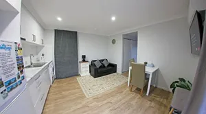 Image of Granny Flat next to golf course