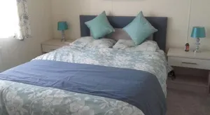 Image of A luxury 6 berth lodge, sleeps 6 a real home from home in the heart of a forest