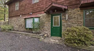Image of Deck with Private Hot Tub Lakefront Raystown Cabin!