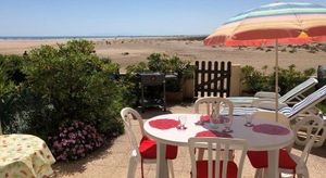 Image of Appartement T3 avec terrasse, véranda et piscine, à 100m de la mer! Parking, animaux acceptés - FR-1-409-179