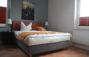 Image of Unterwegs ins Apartmenthaus ehemalige Apartmenthaus Unterwegs