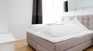 Image of SC 01 by ROCKCHAIR Apartments l SUPERHOST Status l 2 Bedrooms Boxspringbeds Balcony Elevator - Cozy Family & Business Flair welcomes you!