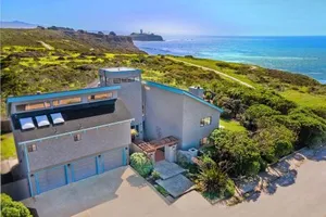 Image of Unmatched Ocean Beach and Mountain Views Family-Friendly Retreat
