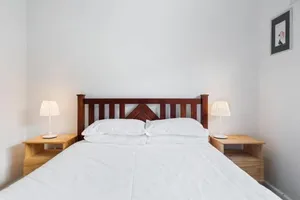Image of Comfy One-Bedroom Unit Between City and Airport