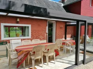 Image of Maison de campagne lumineuse spacieuse dans impasse au calme a proximité d'un chateau deux vérandas grand jardin cabane pour vélos, pres Port en Bessin et Bayeux, proche plages du débarquement
