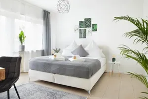 Image of Ajko Homes - Design Apartment - Parkplatz - Balkon - Netflix - 6 Pers