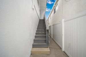 Image of 2 Bedroom Upstairs with Balcony Steps from the Sand