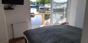 Image of Woonark Westeinder with kayaks close to Schiphol Airport