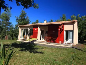 Image of Homey bungalow with dishwasher on a green domain