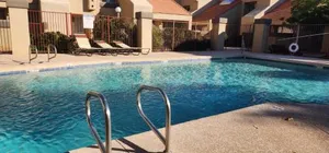 Image of Cozy condo near MCC with pool, BBQ, covered parking