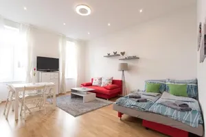 Image of Bright Red Heart Apartment in Leopoldstadt