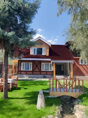 Image of Maay- A riverside Chalet
