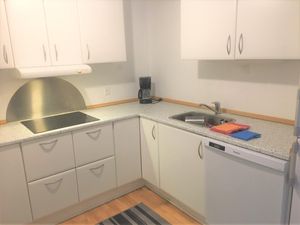 Image of Sanders Constantin - Chic Two-Bedroom Apartment With Balcony