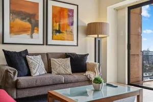 Image of Cozy 2-Bedroom Apartment with City Views