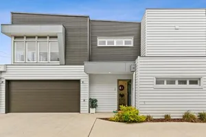 Image of Kismet 3 bedroom luxury townhouse secure back yard walk to the beach and shops Family friendly Double garage parking WIFI