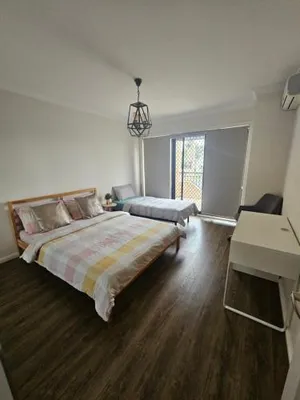 Image of Book a Room with a view for your stay with shared bathroom laundry kitchen and living area